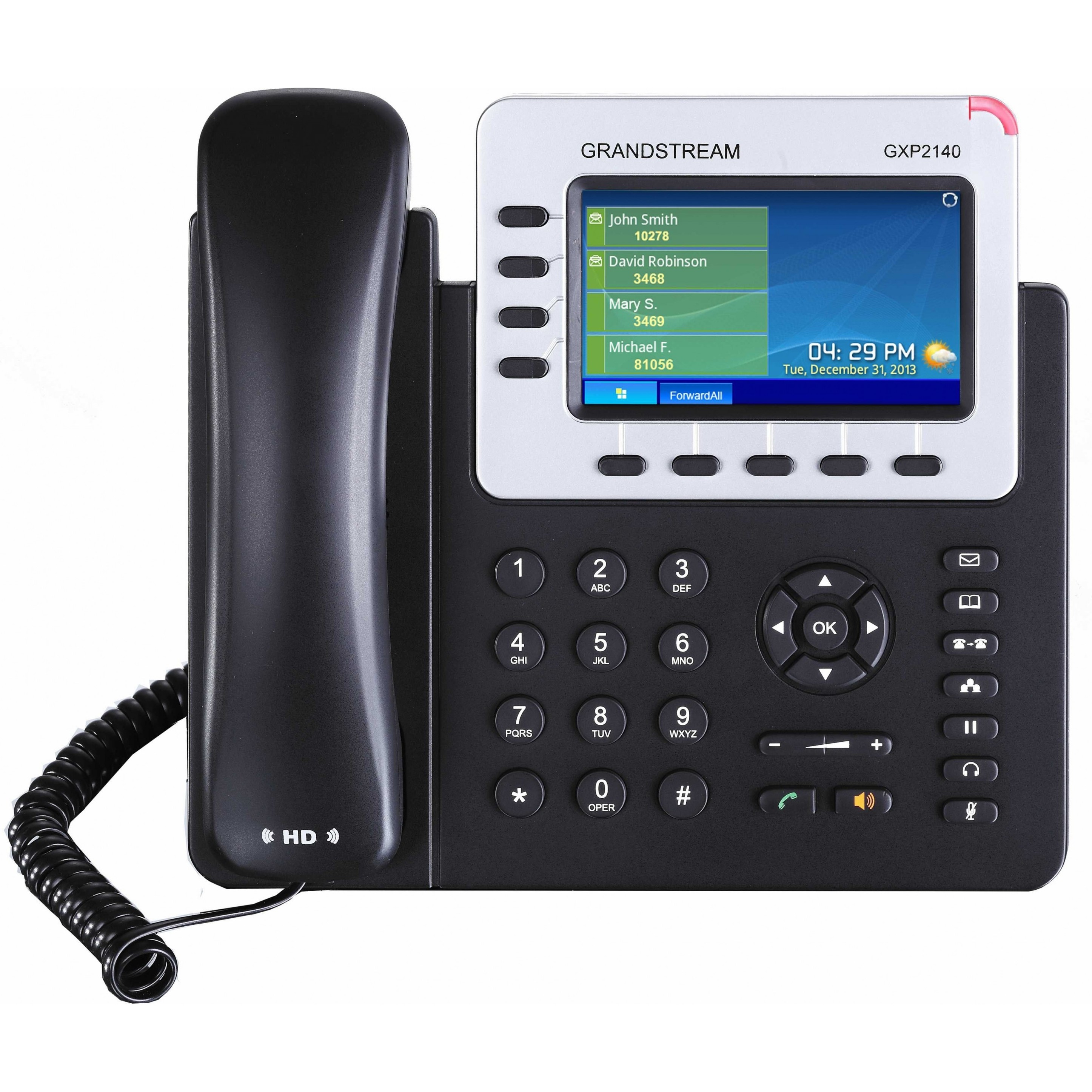 SIP-телефон Grandstream GXP2140 рядом с ноутбуком для входа в веб-интерфейс